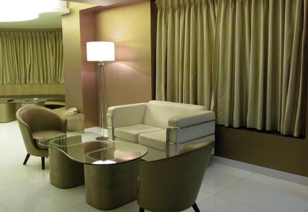 Cocoon Luxury Business Hotel Дханбад Номер фото
